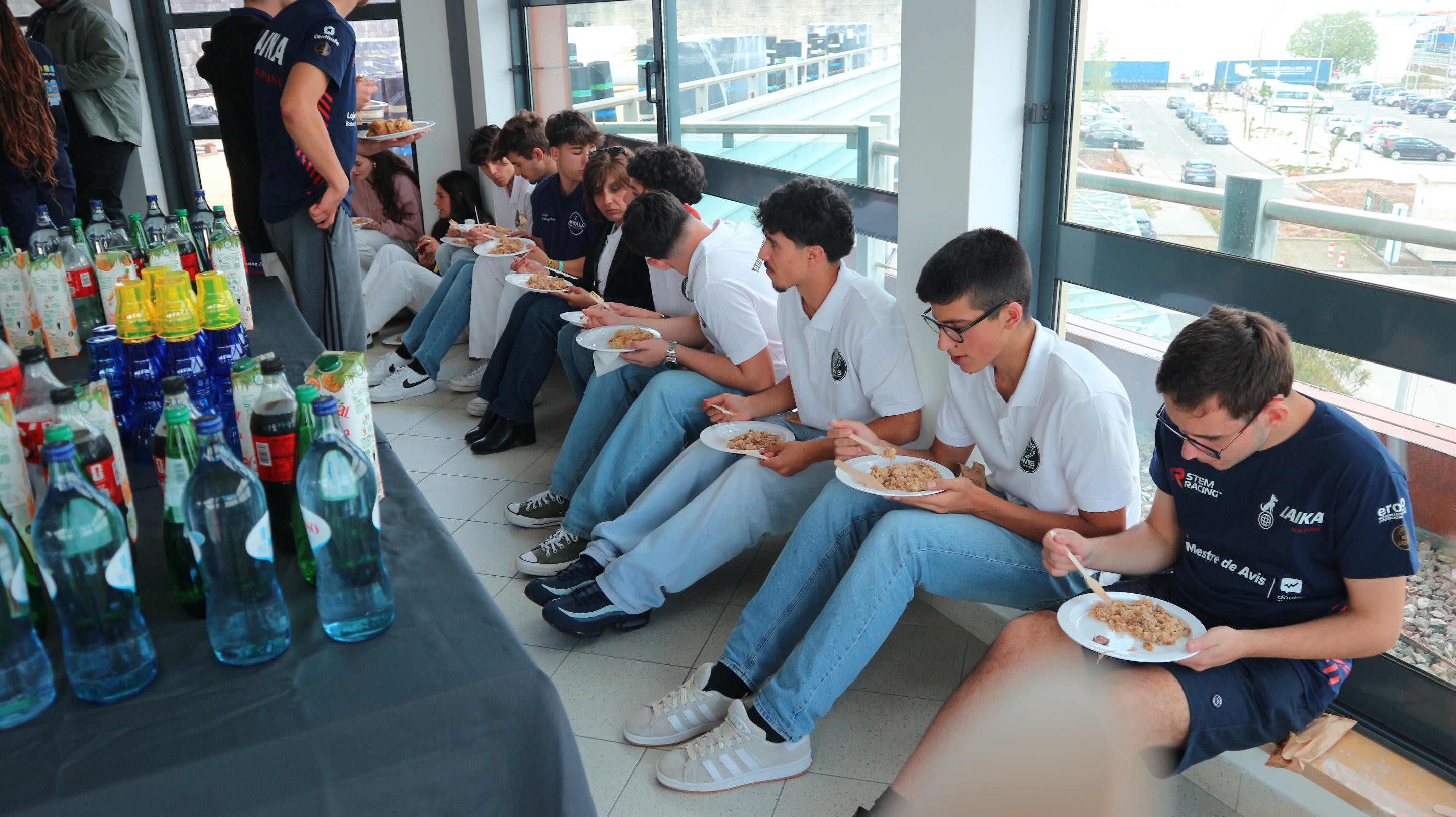 Participantes sentados durante a fase regional